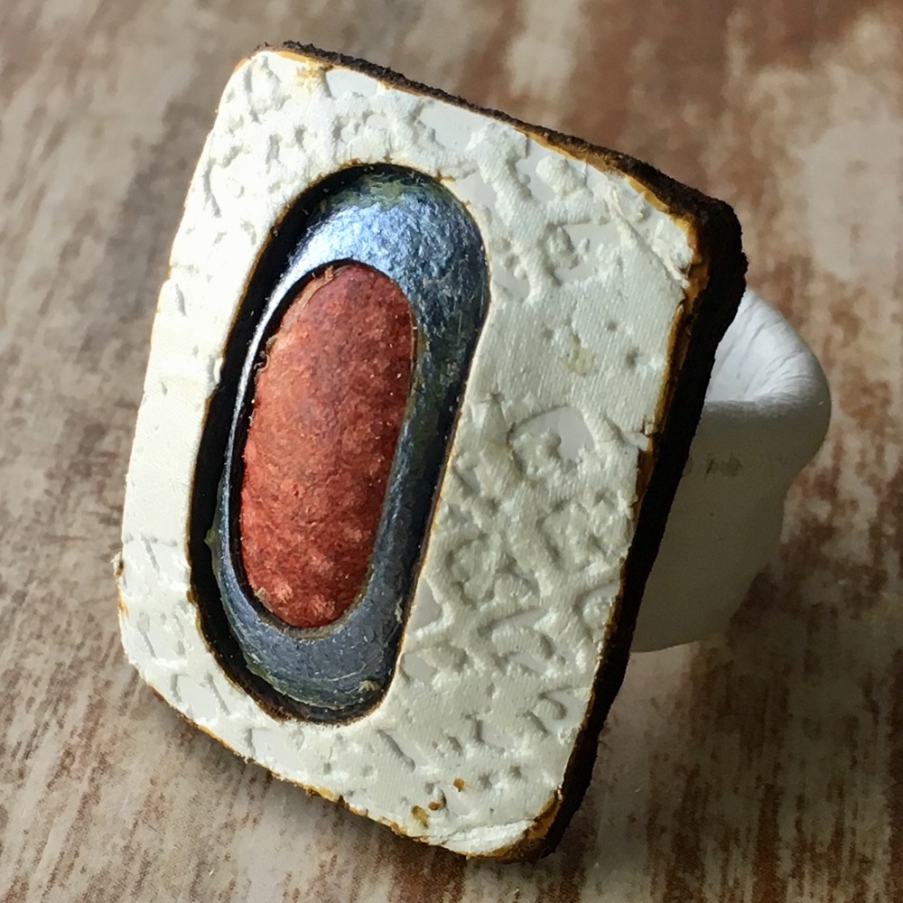 White, blue and white leather ring